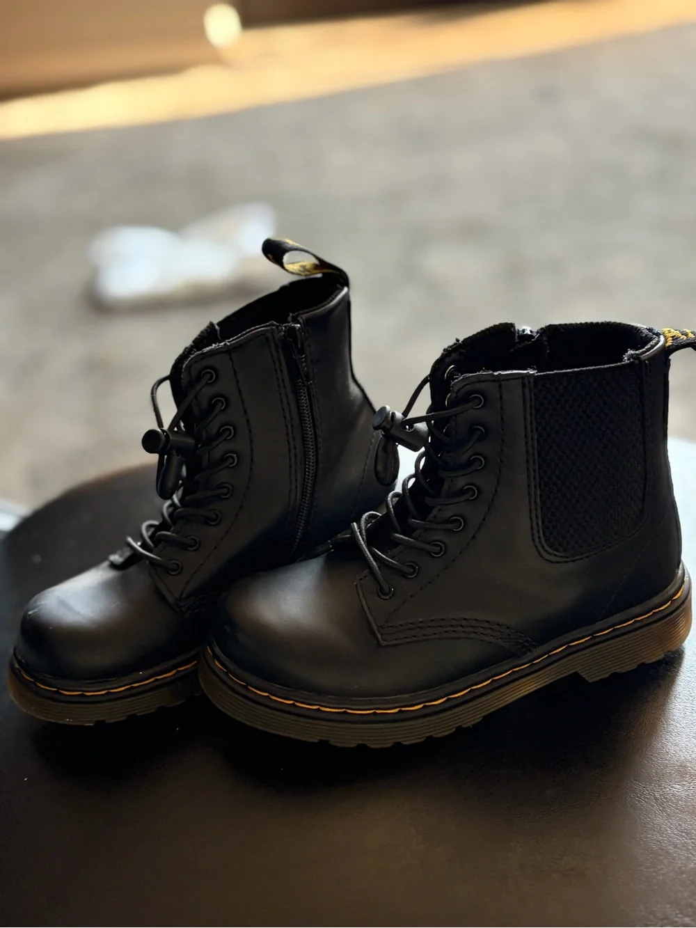Dr. Martens Kids Black Leather Lace-Up Ankle Boots with Yellow Stitching
